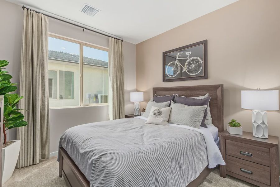 Representative furnished interior of a home built from the 1603 by Elliott Homes in Acacia at Santana, Yuma (Image 18).