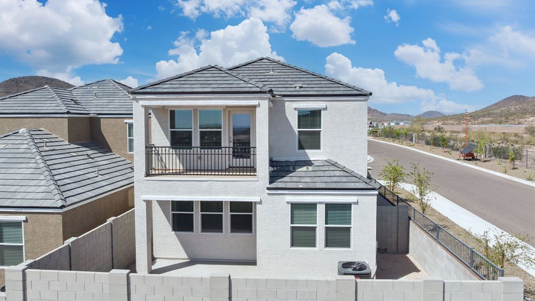 Front exterior of a new home in The Buttes at Mystic, Peoria, AZ, highlighting curb appeal (Image 28).