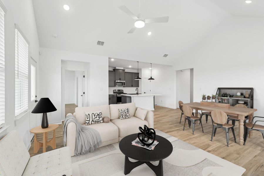 Impressive great room and dining area with high ceilings (*Photo not of actual home and used for illustration purposes only.)