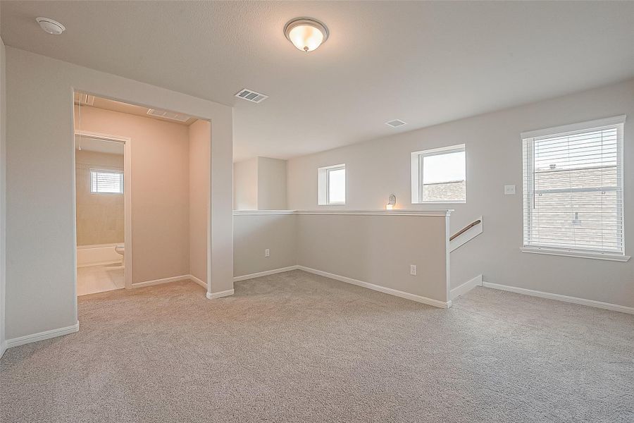 Spacious, unfurnished interior of a new home in Rates starting as low as, Iowa Colony (Image 28).