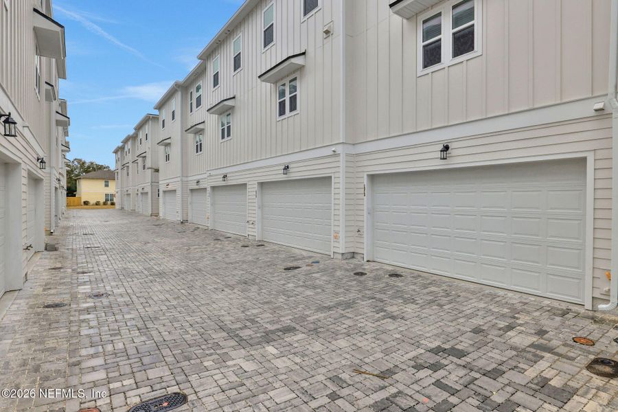 Exterior details and patio area of a home in North Beach Townhomes, Jacksonville Beach (Image 22).