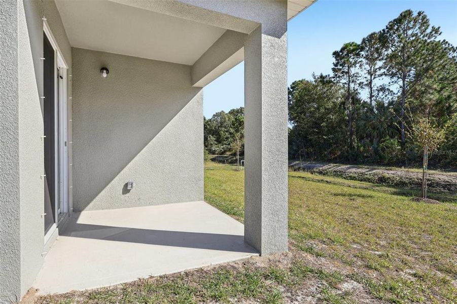 Exterior details and patio area of a home in Palm Bay Classic, Palm Bay (Image 8).