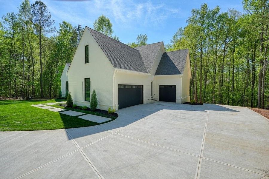 Front exterior of a new home in , Canton, GA, highlighting curb appeal (Image 32).