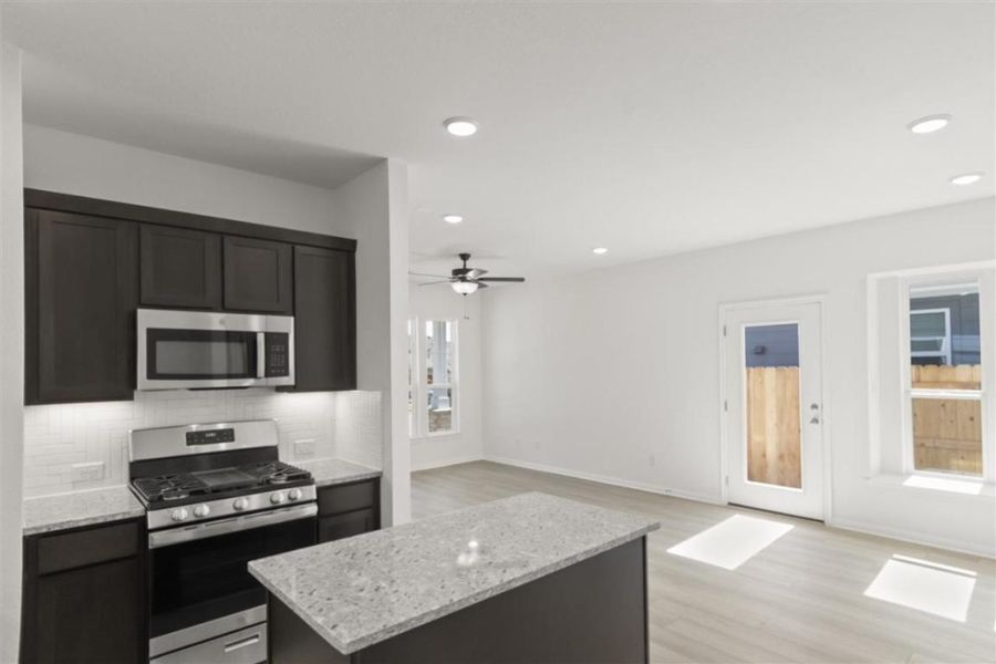 Furnished interior view inside a new home in Trace, San Marcos (Image 10).