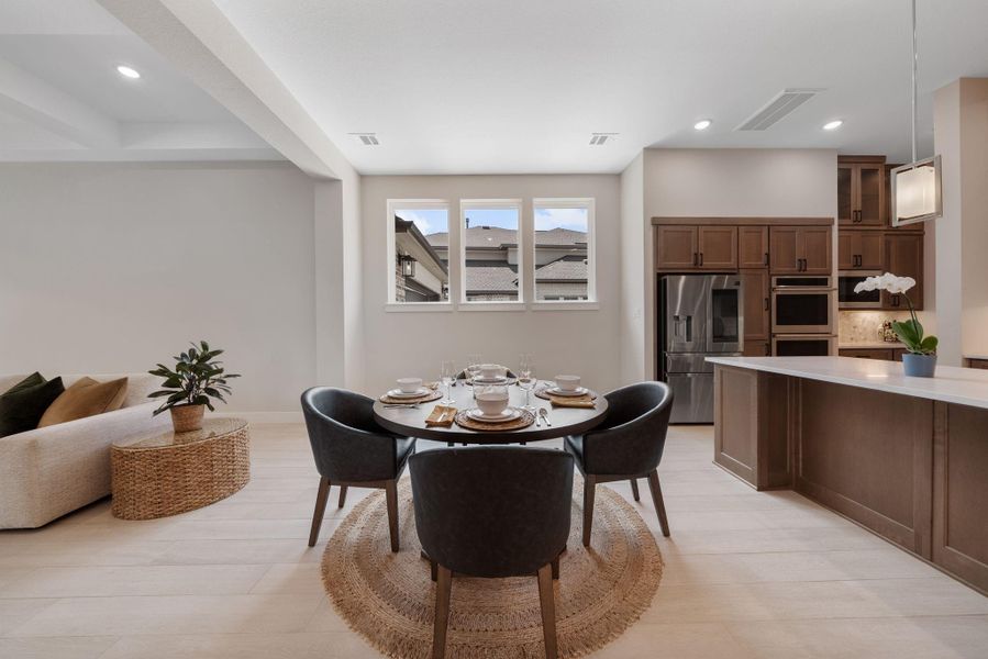 The dining area is a perfect blend of comfort and style, seamlessly connected to the living room and kitchen, making it ideal for both everyday meals and entertaining guests. The dining area is a perfect blend of comfort and style, seamlessly connected to the living room and kitchen, making it ideal for both everyday meals and entertaining guests.