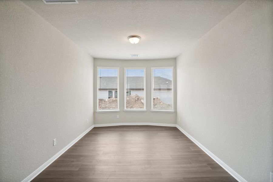 Dining room in the Rio Grande floorplan at a Meritage Homes community. Dining room in the Rio Grande floorplan at a Meritage Homes community.