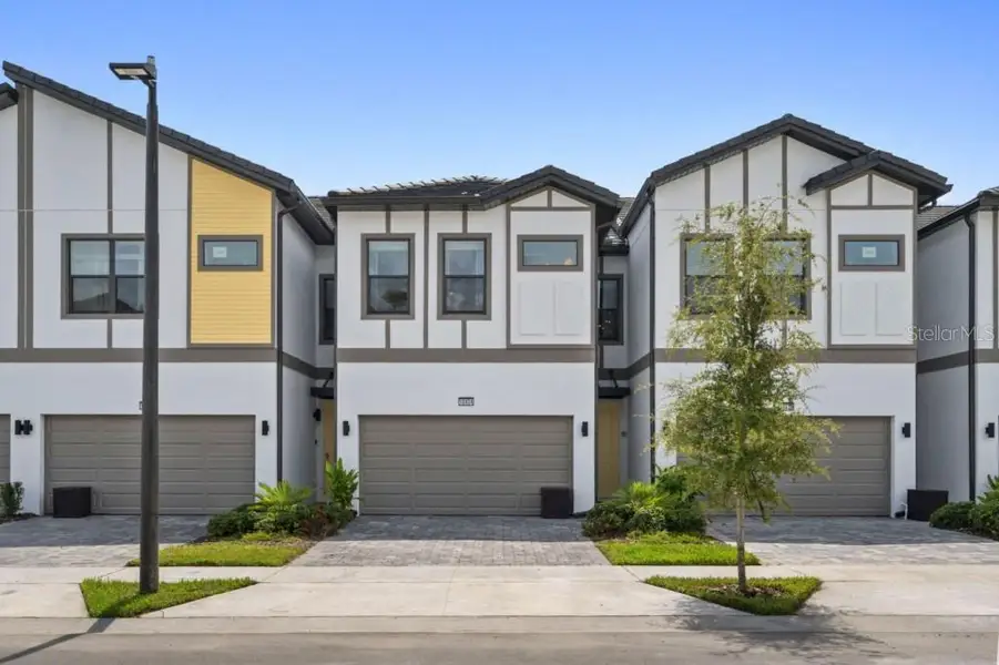 Front exterior of a new home in , Orlando, FL, highlighting curb appeal (Image 2). Front exterior of a new home in , Orlando, FL, highlighting curb appeal (Image 2).