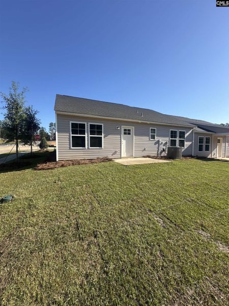 Exterior details and patio area of a home in Piney Woods Bluff, Columbia (Image 3).