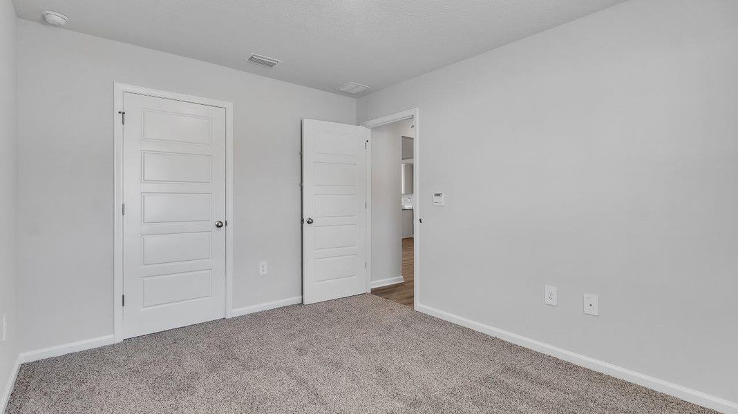 Spacious, unfurnished interior of a new home in Wesley Park, Crawfordville (Image 27).