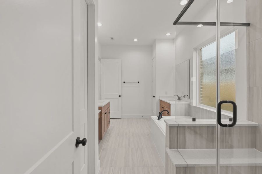 Representative furnished interior of a home built from the Sorenstam by Chesmar Homes in Riceland Alley Loads, Mont Belvieu (Image 51).