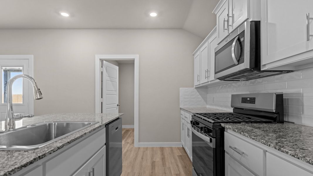 Representative furnished interior of a home built from the COLEMAN by D.R. Horton in Heritage Parks, Abilene (Image 8). Representative furnished interior of a home built from the COLEMAN by D.R. Horton in Heritage Parks, Abilene (Image 8).