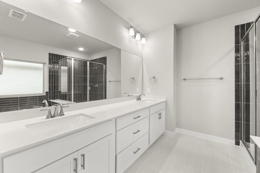 Representative furnished interior of a home built from the Hickory Sunterra 50s by Brohn Homes in Sunterra, Katy (Image 8).