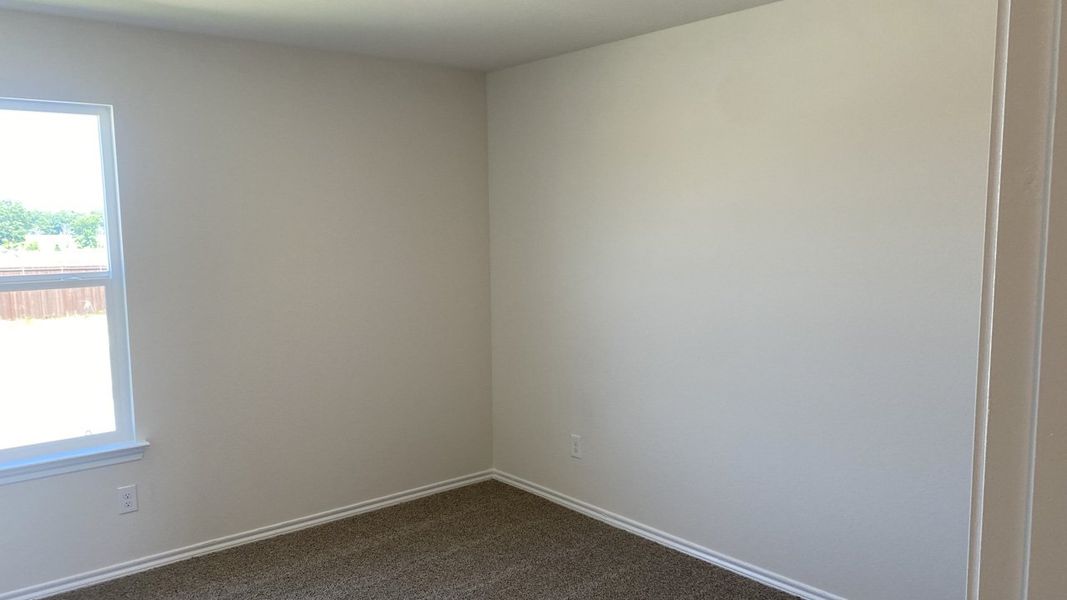 Spacious, unfurnished interior of a new home in Creeks at Burnett Trail, Canton (Image 11).