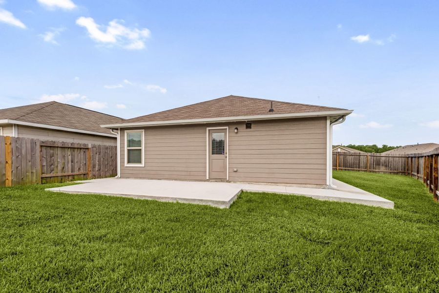 Exterior details and patio area of a home in , Splendora (Image 3).