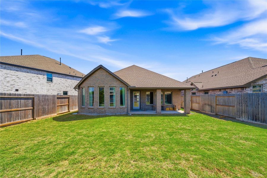 Exterior details and patio area of a home in Candela, Richmond (Image 28).