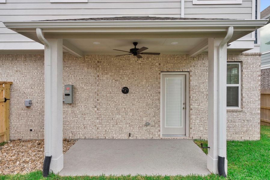 Exterior details and patio area of a home in Balmoral, Humble (Image 4).