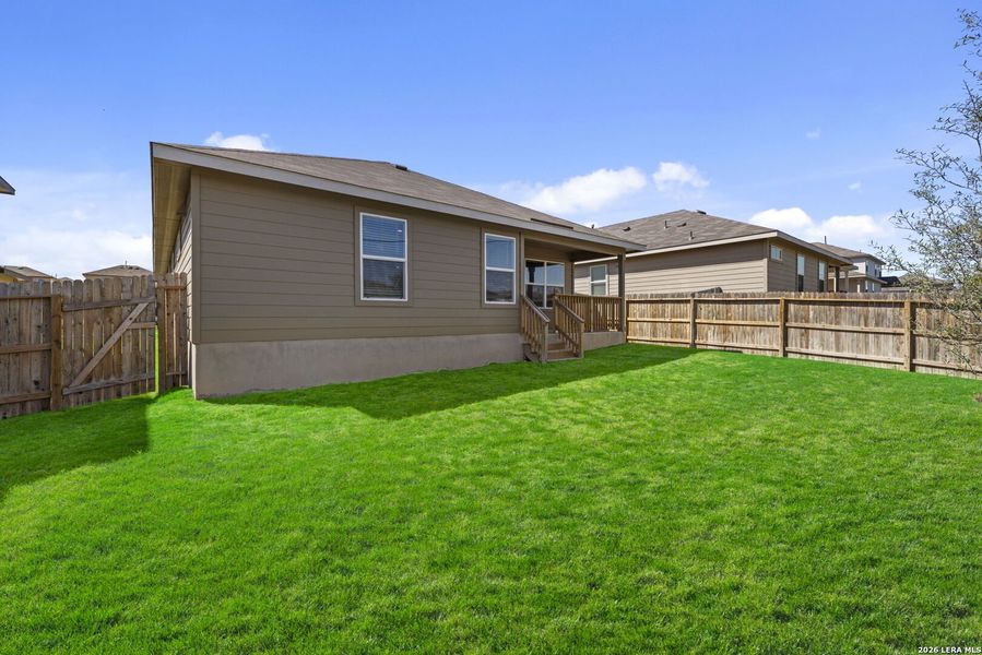 Exterior details and patio area of a home in Redbird Ranch, San Antonio (Image 16).