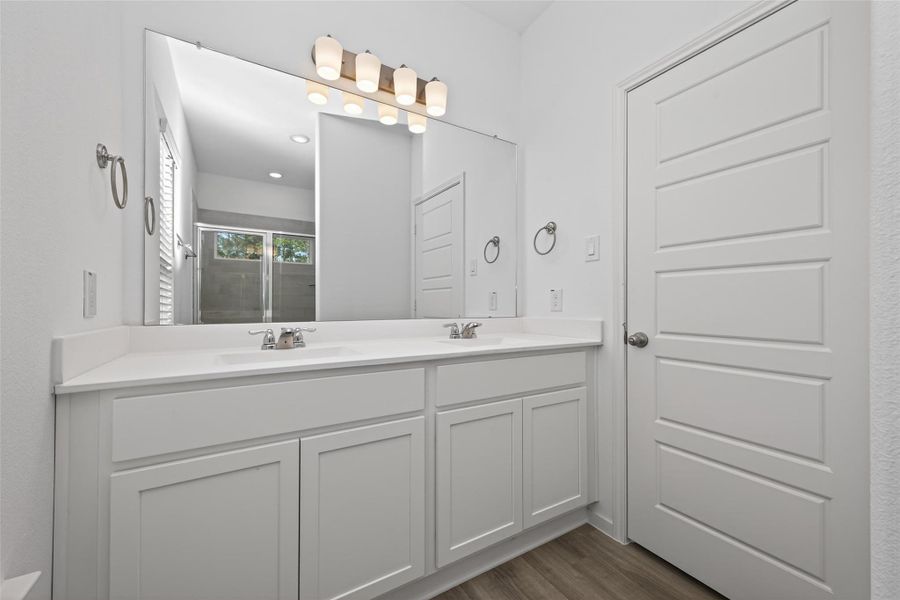 Furnished interior view inside a new home in Enclave at Willis, Willis (Image 8).