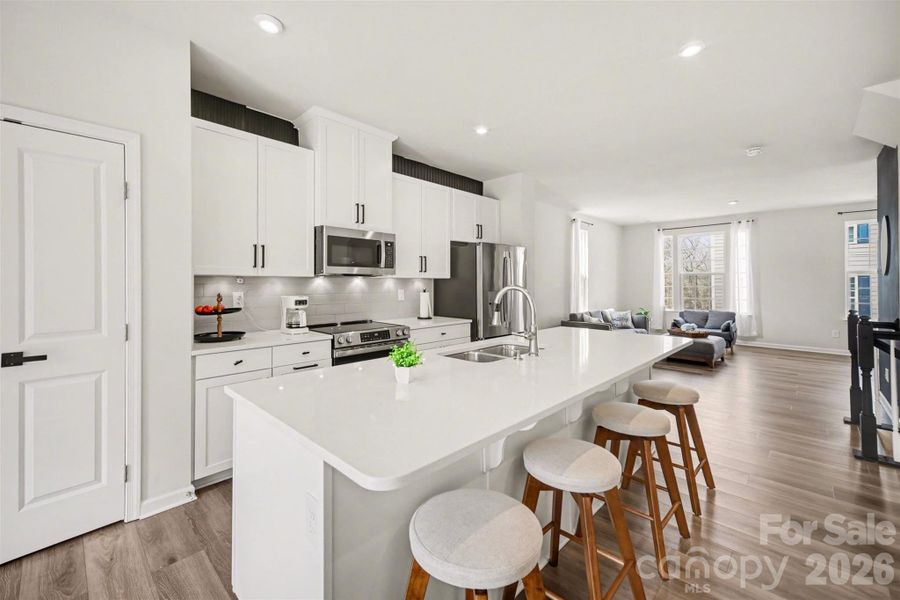 Stainless steel appliances, with beautiful cabinetry