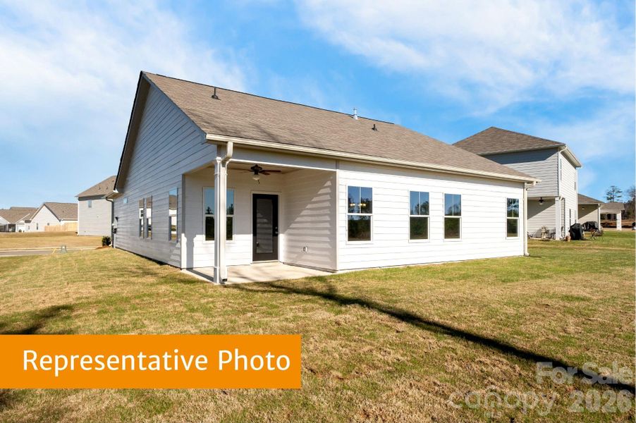 Exterior details and patio area of a home in Pine Bluff, Midland (Image 2). Exterior details and patio area of a home in Pine Bluff, Midland (Image 2).