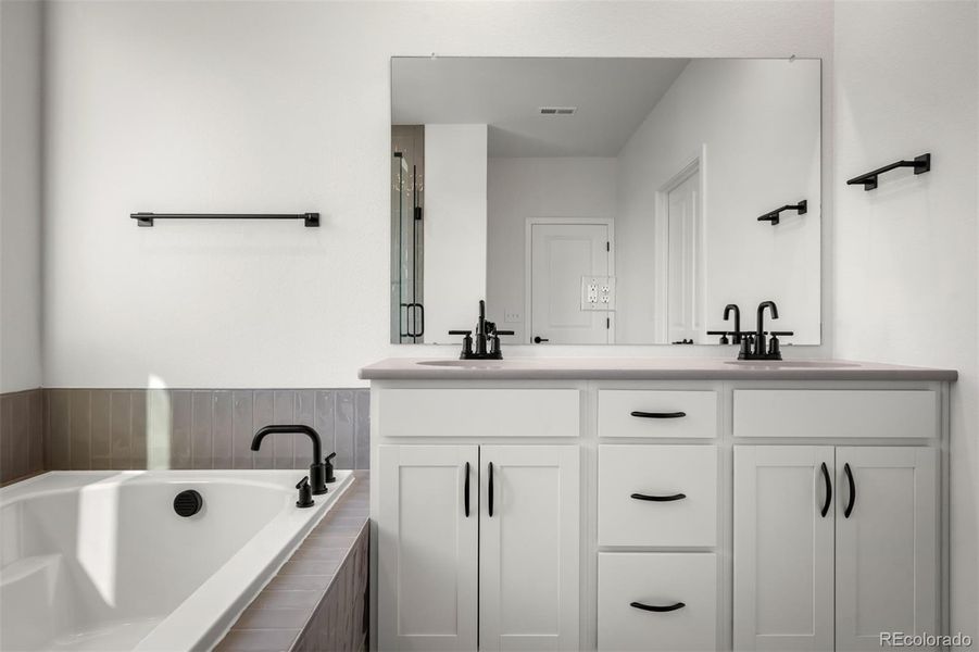 Furnished interior view inside a new home in Revel Crossing at Wolf Ranch – The Outlook Collection, Colorado Springs (Image 15).