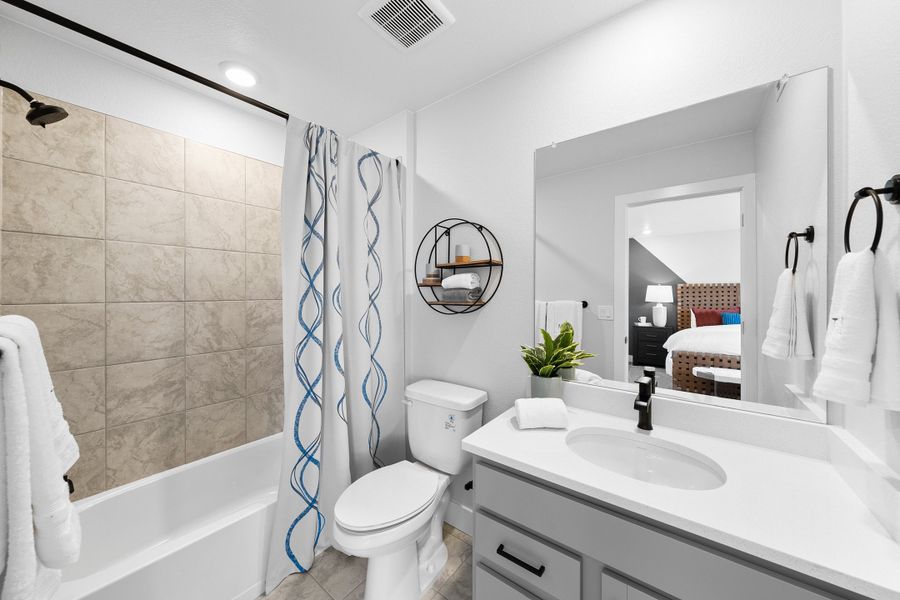 Furnished interior view inside a new home in Trailstone, Arvada (Image 14).