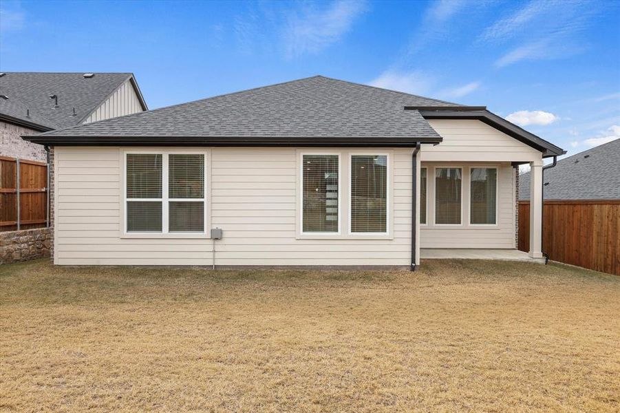 Exterior details and patio area of a home in Talon Hills, Saginaw (Image 17).