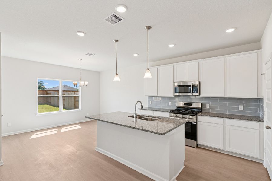 The Oriole II- Kitchen and Breakfast Area. Sample image to be used for example only, colors, options and upgrades vary.