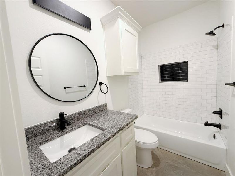 Bathroom with shower / washtub combination and vanity Bathroom with shower / washtub combination and vanity