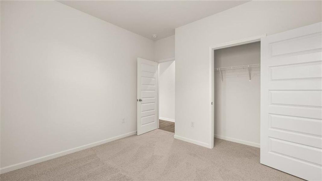 Spacious, unfurnished interior of a new home in Brooks Station, Dacula (Image 24).