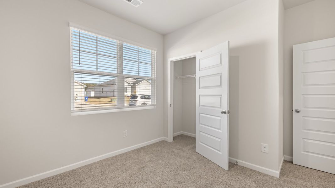 Representative unfurnished interior of a home built from the CALI Express by D.R. Horton in Teamon Pointe, Griffin (Image 24).