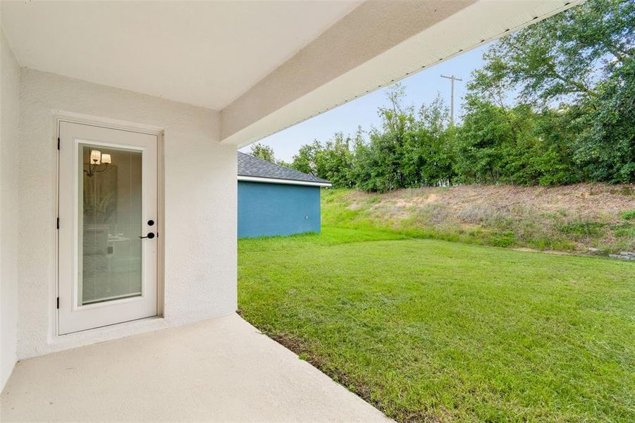 Exterior details and patio area of a home in Abbey Glen, Dade City (Image 44). Exterior details and patio area of a home in Abbey Glen, Dade City (Image 44).