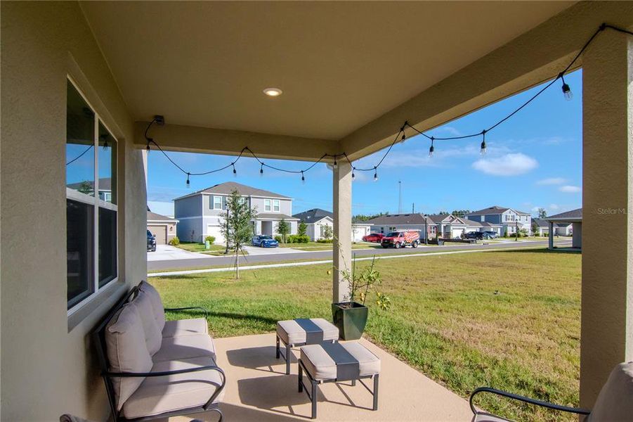 Exterior details and patio area of a home in Riverstone, Land O' Lakes (Image 2). Exterior details and patio area of a home in Riverstone, Land O' Lakes (Image 2).
