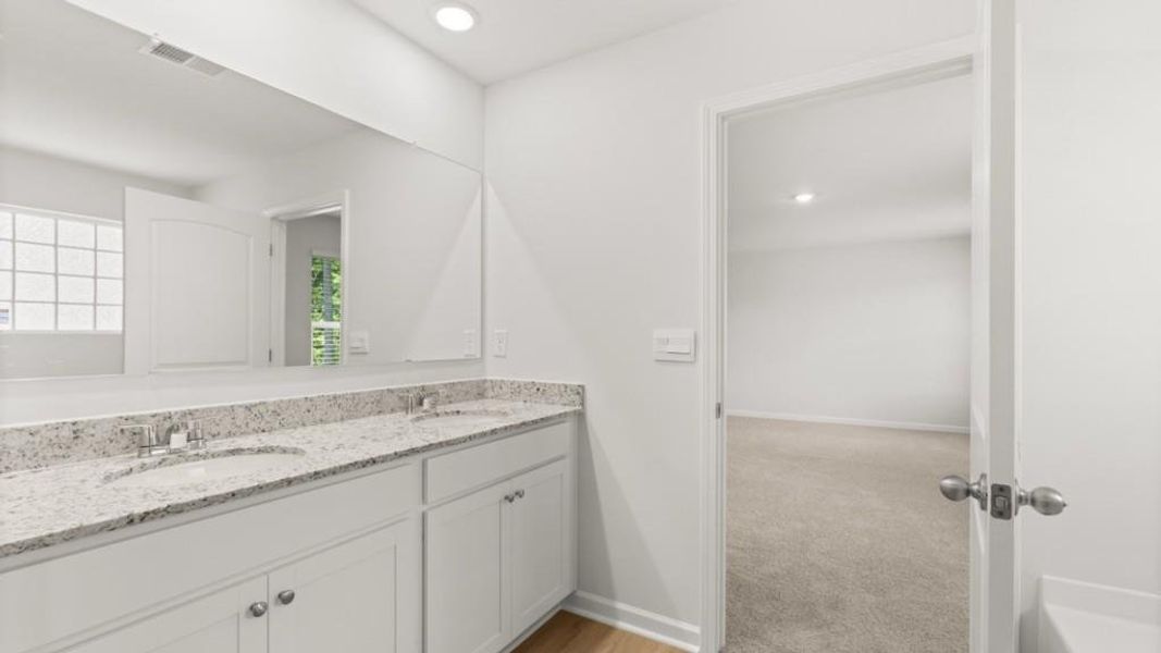 Furnished interior view inside a new home in Northwoods at Mirror Lake, Villa Rica (Image 7).