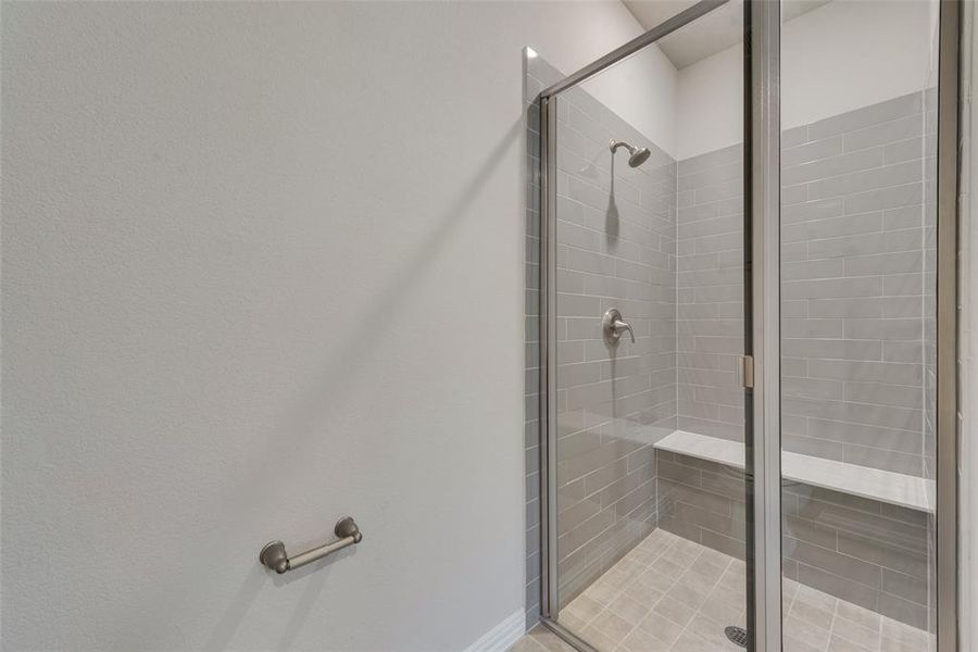 Bathroom featuring walk in shower