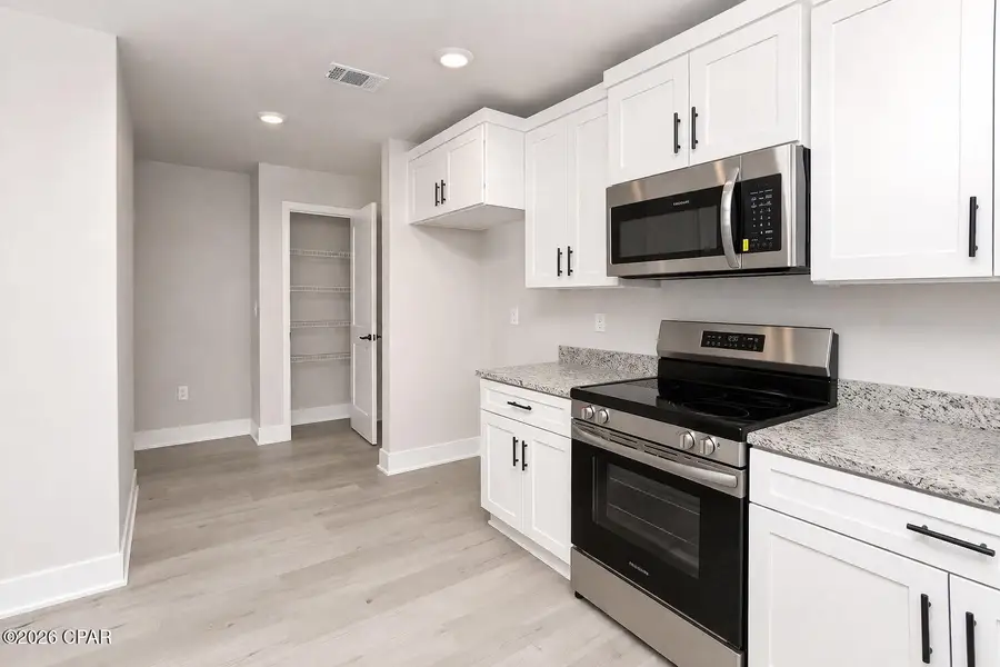 Furnished interior view inside a new home in Fox Glenn, Panama City (Image 4).