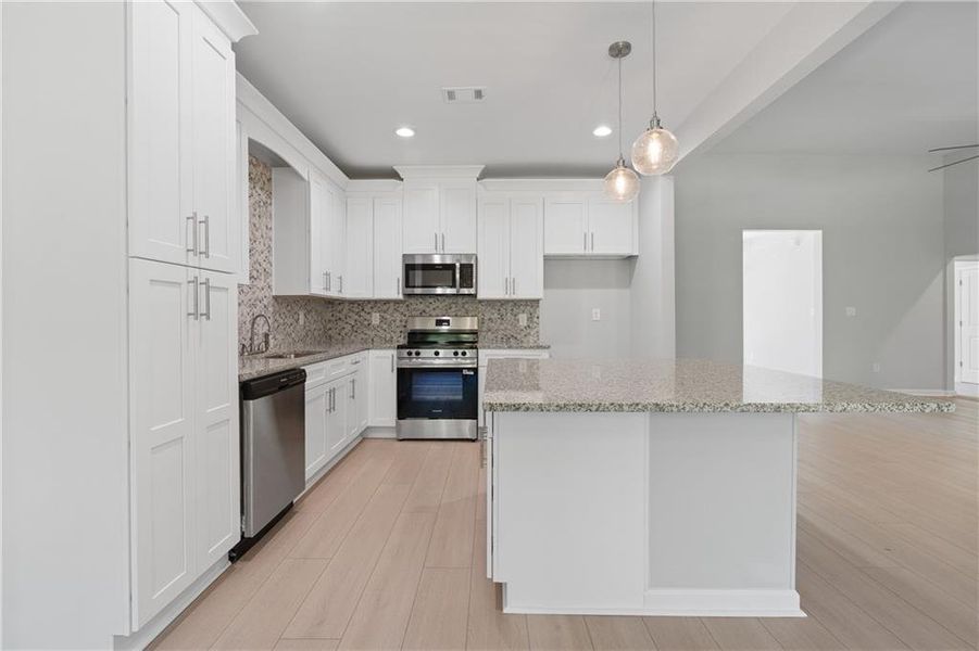 Furnished interior view inside a new home in , Gray (Image 16).