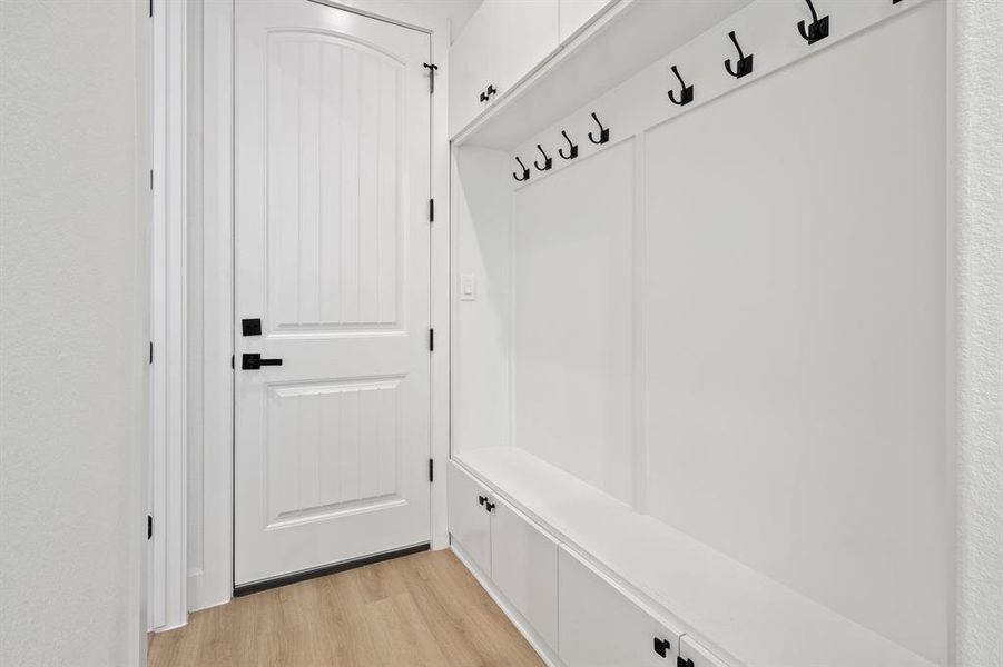 Mudroom featuring light hardwood / wood-style floors