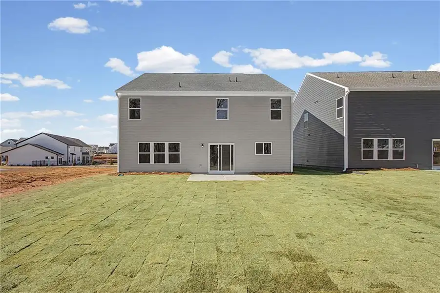 Exterior details and patio area of a home in Twin Lakes, Hoschton (Image 3). Exterior details and patio area of a home in Twin Lakes, Hoschton (Image 3).