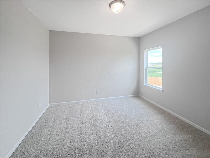 The Caldwell- Bedroom 3. Sample image for illustration; upgrades, options, and colors may vary.