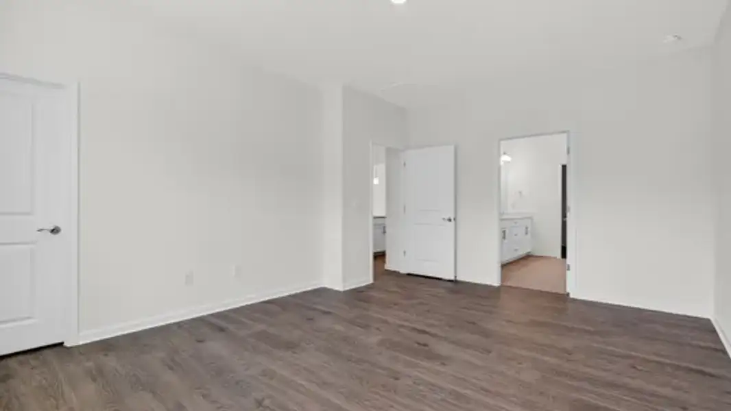 Spacious, unfurnished interior of a new home in The Villas at Galvins Ridge, Sanford (Image 21).