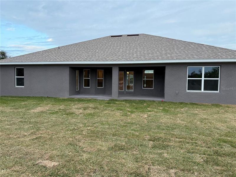 Exterior details and patio area of a home in South Gulf Cove, Port Charlotte (Image 2).