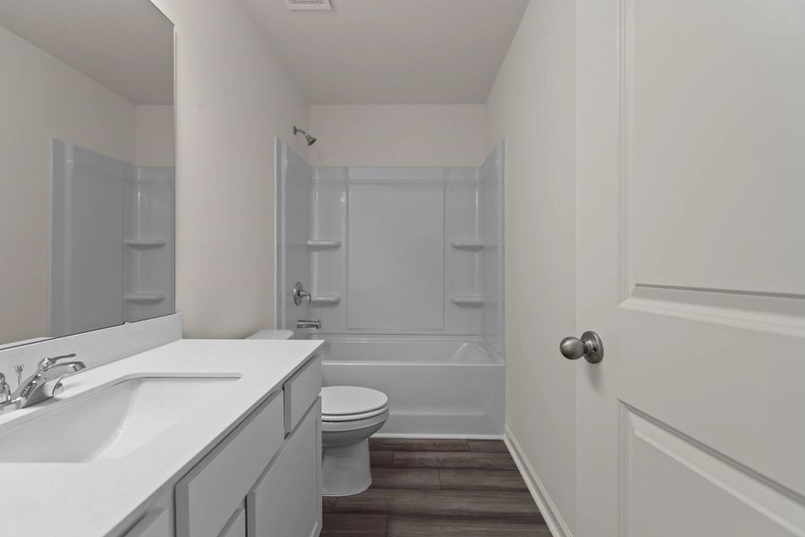 Representative furnished interior of a home built from the Hubble by Starlight Homes in Bayview, Conway (Image 13).