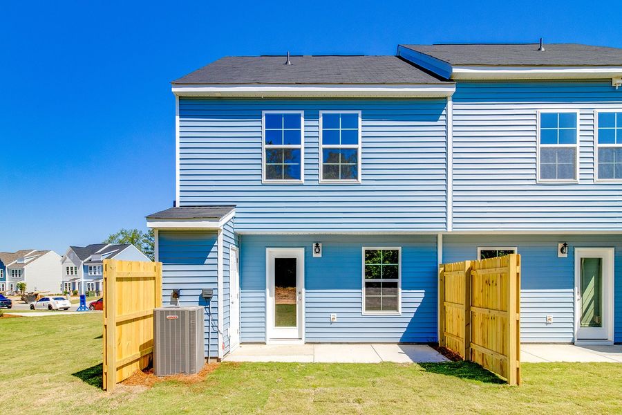 Exterior details and patio area of a home in Padgett Commons, Hopkins (Image 20).