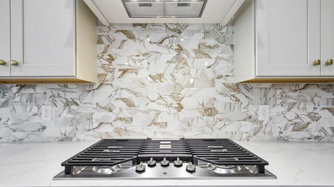 Gas stovetop with tile backsplash Gas stovetop with tile backsplash