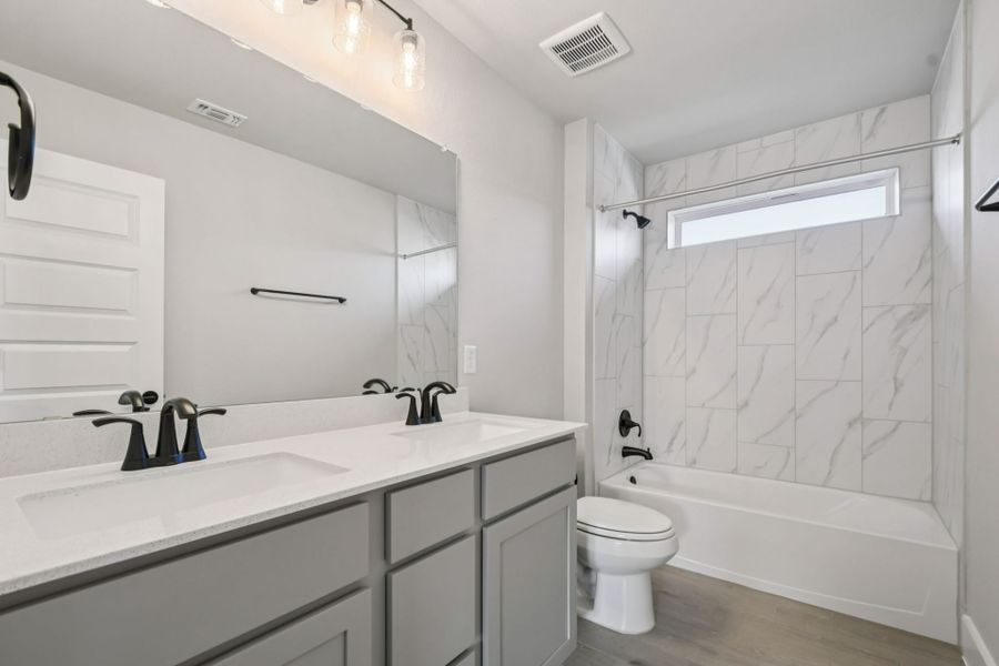 Furnished interior view inside a new home in Whisper Valley, Manor (Image 8).