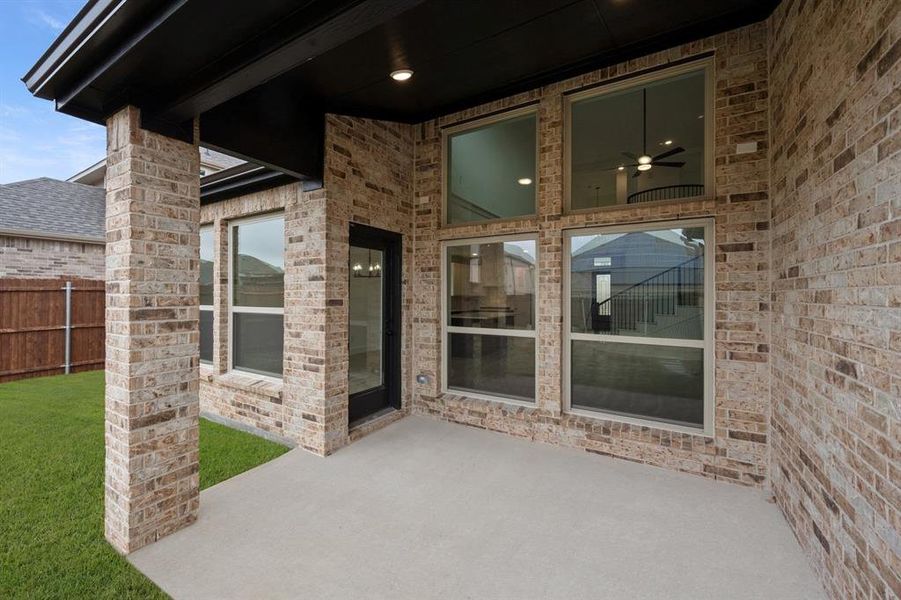Exterior details and patio area of a home in Hawkins Meadows, Midlothian (Image 25).