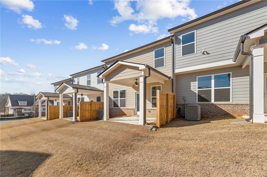 Exterior details and patio area of a home in Mulberry Summit, Flowery Branch (Image 16). Exterior details and patio area of a home in Mulberry Summit, Flowery Branch (Image 16).