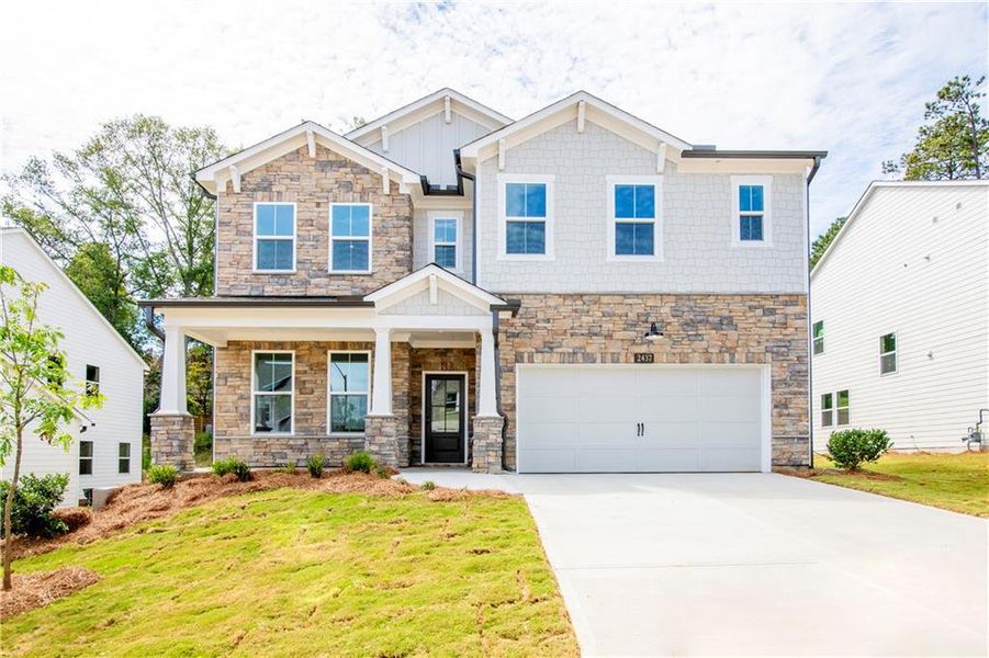 Front exterior of a new home in Hopewell Reserve, Cumming, GA, highlighting curb appeal (Image 21).