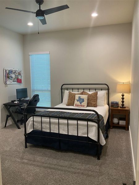 Private bath located in bedroom 4 downstairs with gorgeous custom floor to ceiling tiled shower